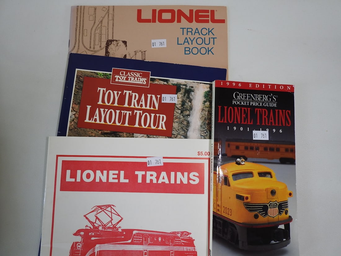 Lionel Train Catalogs and Reference Book Lot: Lot of Lionel train catalogs and reference books. Mixed late 20th century model railroad reference material, measured as packed. Approx. 1.5 x 11.5 x 8.5 in.