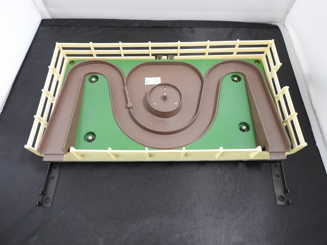 Lionel Operating Horse Loader / Horse Corral Accessory: Lionel operating horse loader / horse corral accessory with fenced platform and operating ramp. Handwritten note states complete and working, excellent. Postwar-era Lionel accessory, mid-20th