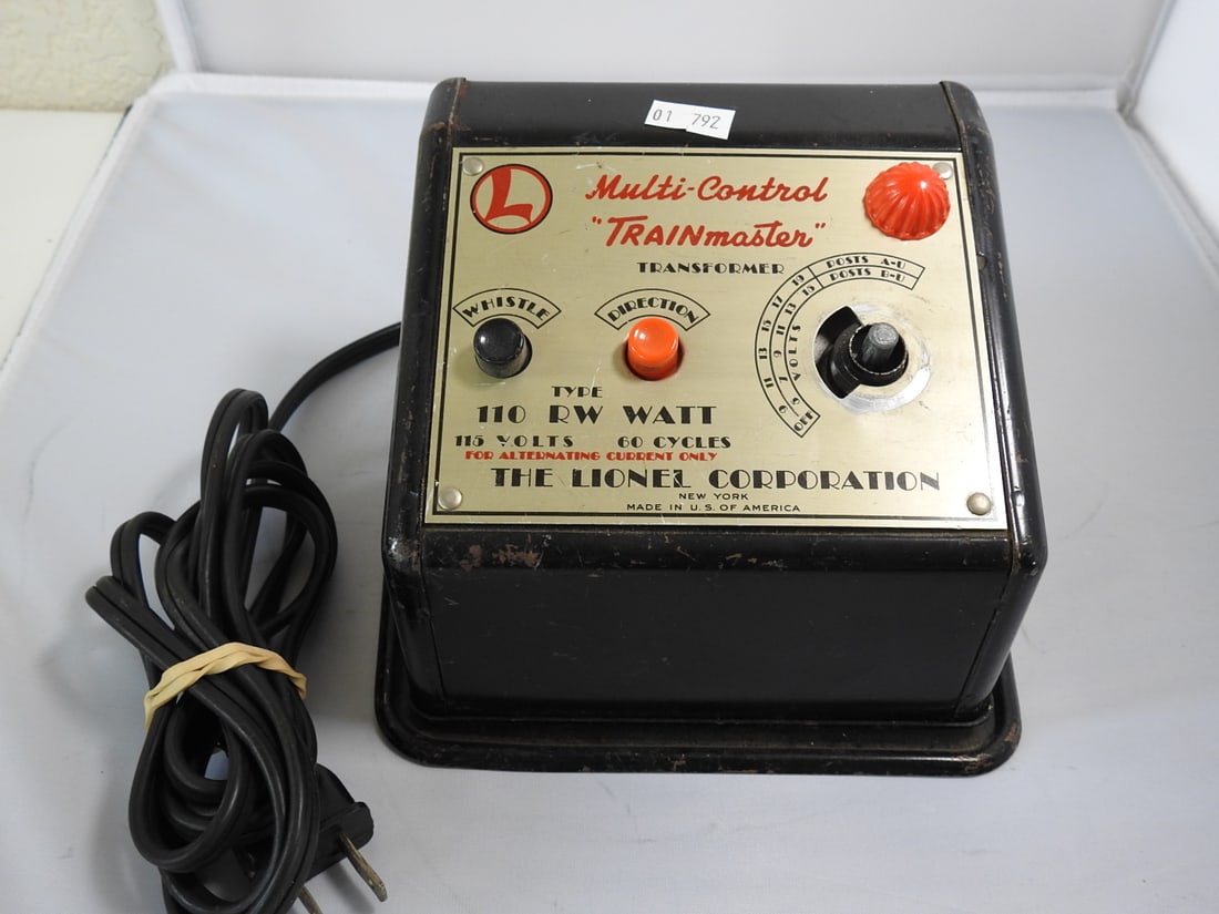 Lionel Multi-Control Trainmaster Transformer: Lionel multi-control Trainmaster transformer in metal and hard plastic construction. Vintage Lionel transformer / power control unit, mid-20th century style. Approx. 4.75 x 6.5 x 5.75 in.