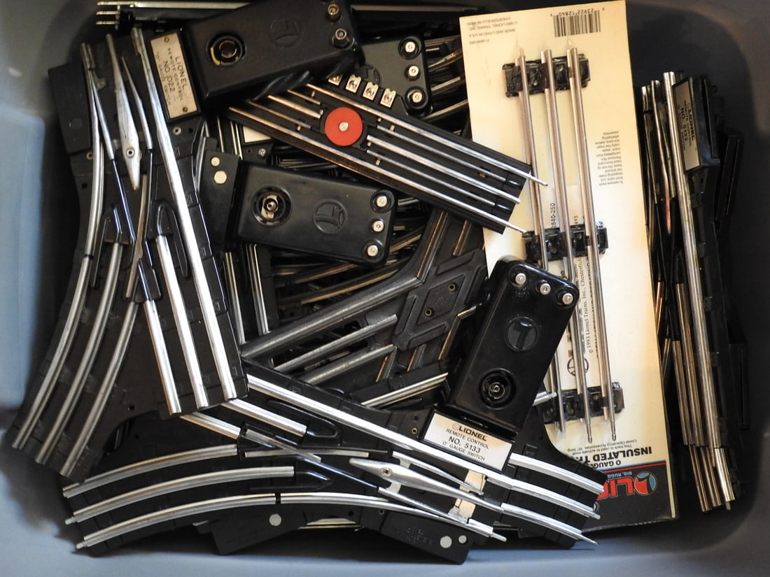 Tub of Lionel Train Track, Remote Controls and Track Switches (1 of 5)