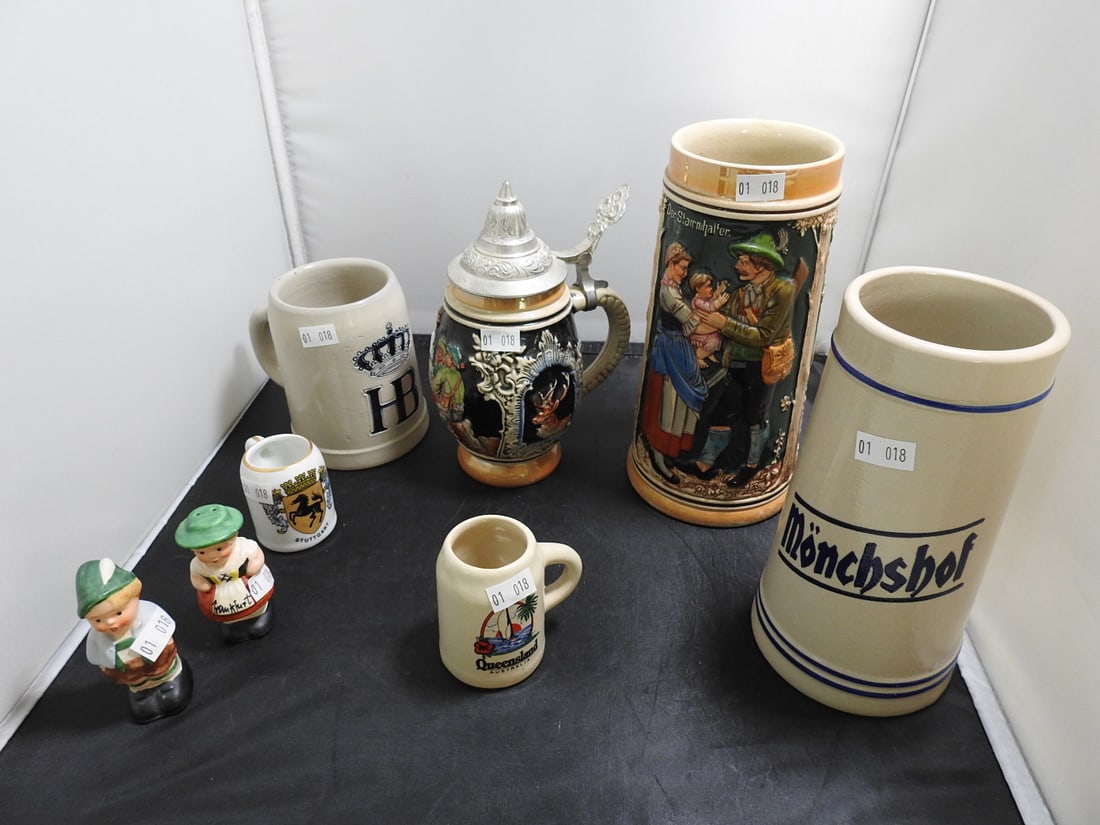 Vintage German Beer Stein and Stoneware Mug Group: Vintage German beer stein and stoneware mug group with assorted lidded steins, mugs, and small decorative pieces. Measured as packed. Approx. 9 x 12 x 8 in.