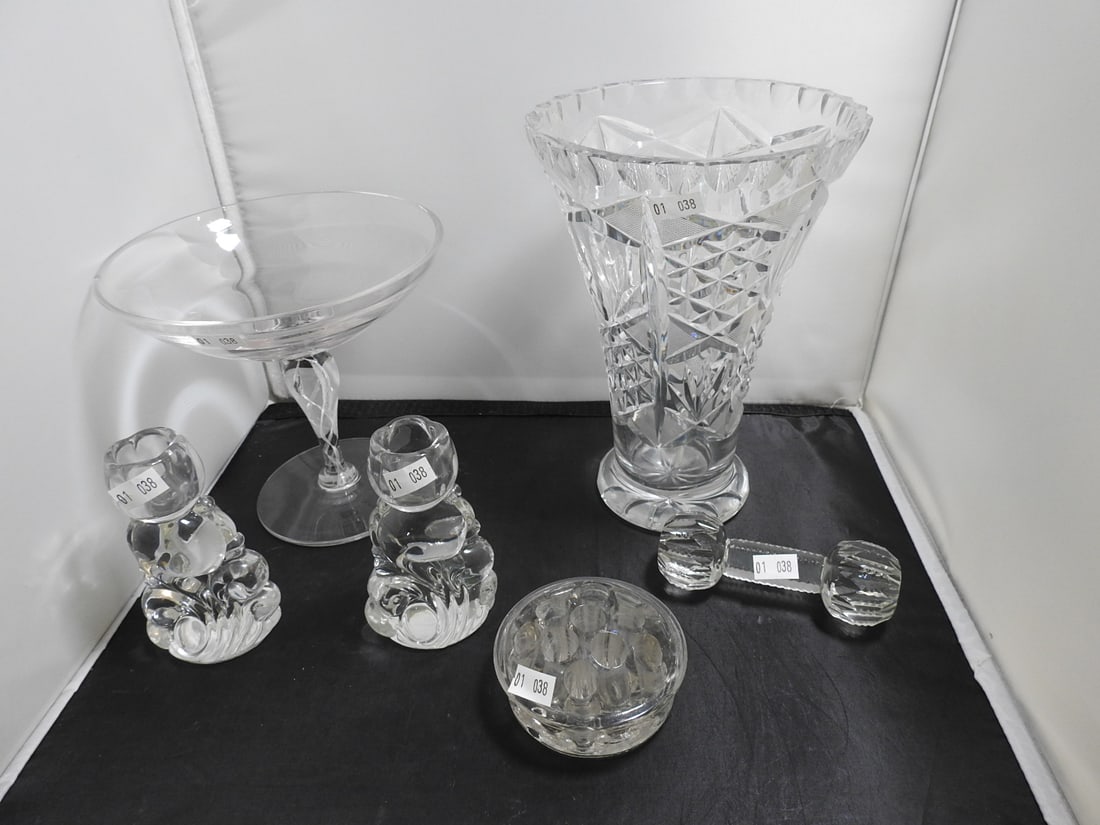 Mixed Lead Crystal and Sun Purple Glass Group: Mixed glass group including lead crystal pieces, sun purple glass, knife rest, flower frog, and pedestal bowl. Note states rim area on the pedestal bowl has a smoothed-out chip. Approx. 8.5 x 7 x 7