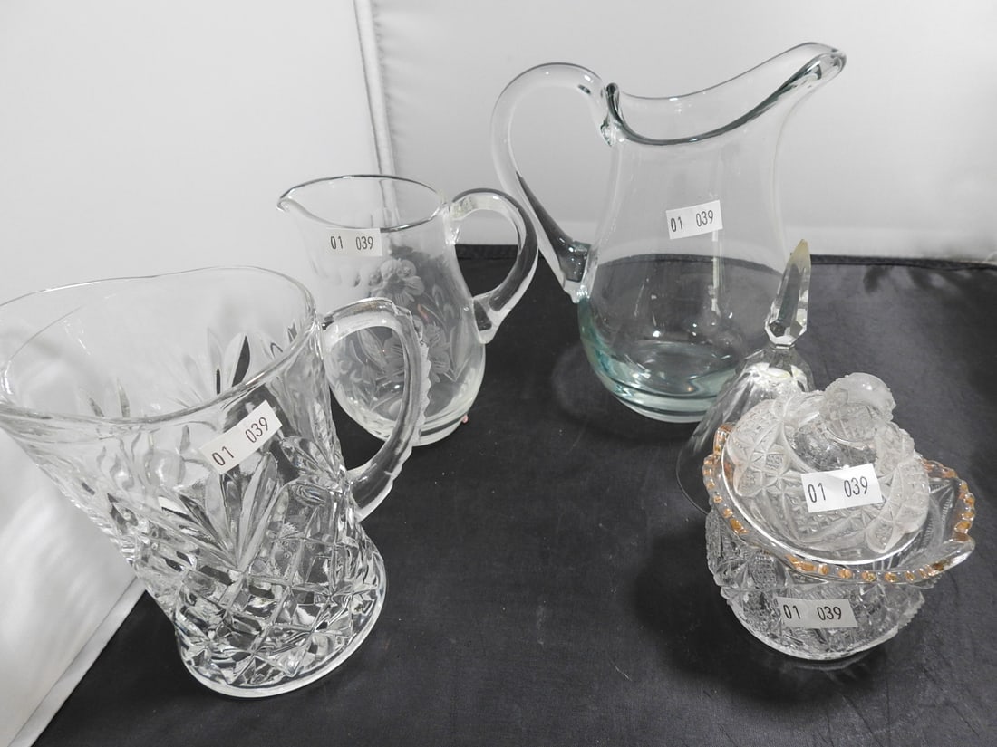 Vintage Glass Pitcher, Sugar Pot and Bell Group: Vintage glass group including pitcher, sugar pot, and bell with assorted clear glass decoration. Approx. 7 x 7 x 8 in.