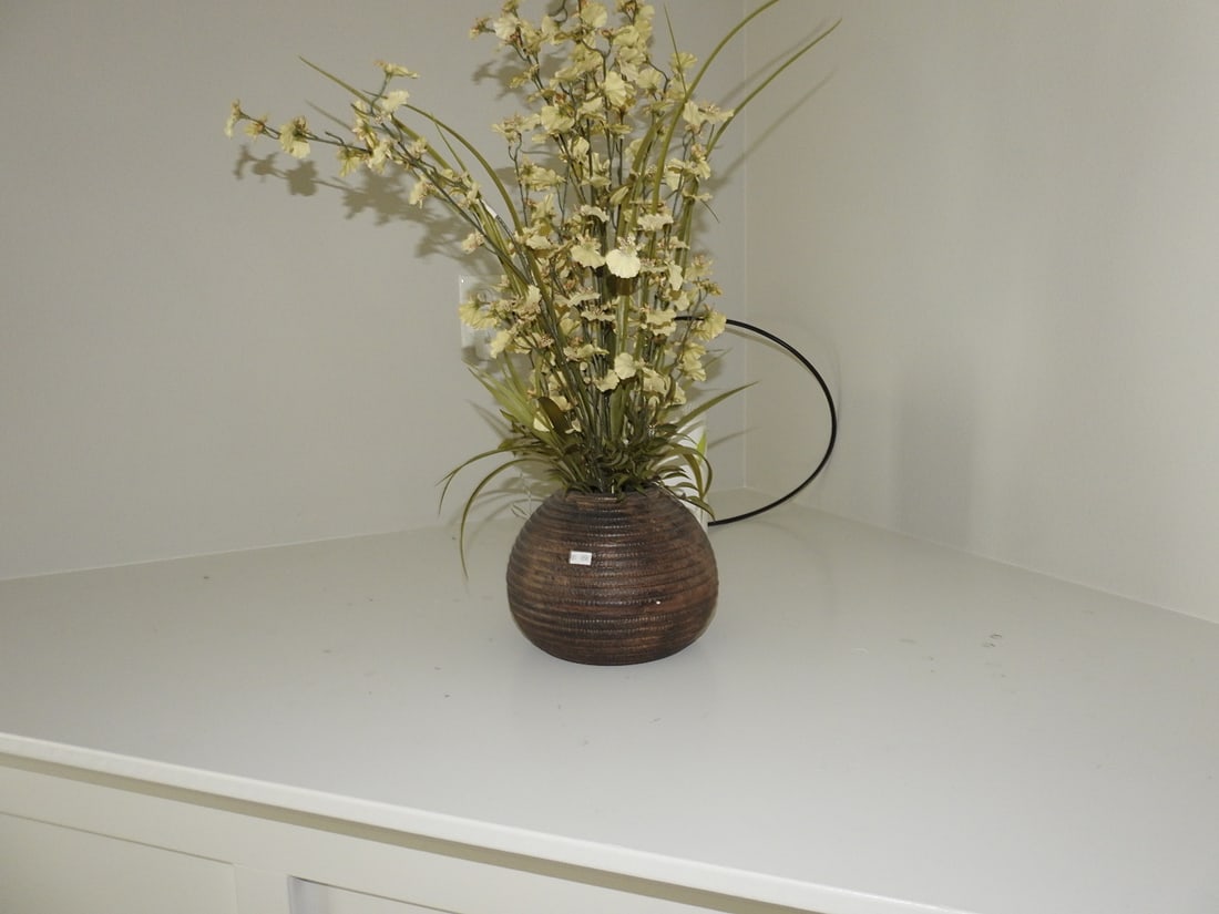 Silk Flower Arrangement in Decorative Vase: Silk flower arrangement in decorative vase with light-colored floral stems. Approx. 28 x 9 x 9 in.