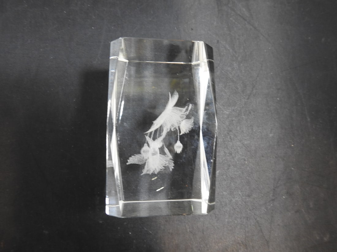 Lead Crystal Paperweight: Lead crystal paperweight with faceted form; note indicates small silver chip as shown. Approx. 3.25 x 2.25 x 2.25 in.