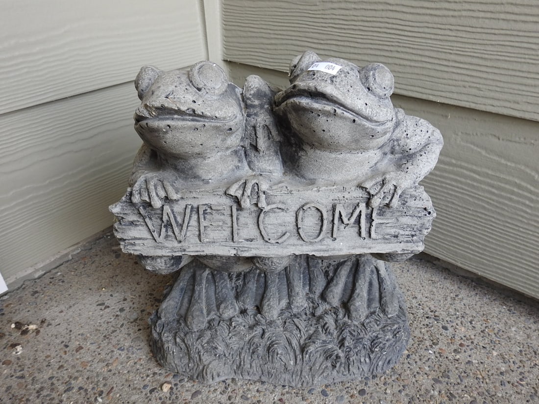 Welcome Frog Garden Statue: Decorative welcome frog statue for garden or porch display. Approx. 11.5 x 10.5 x 7 in.