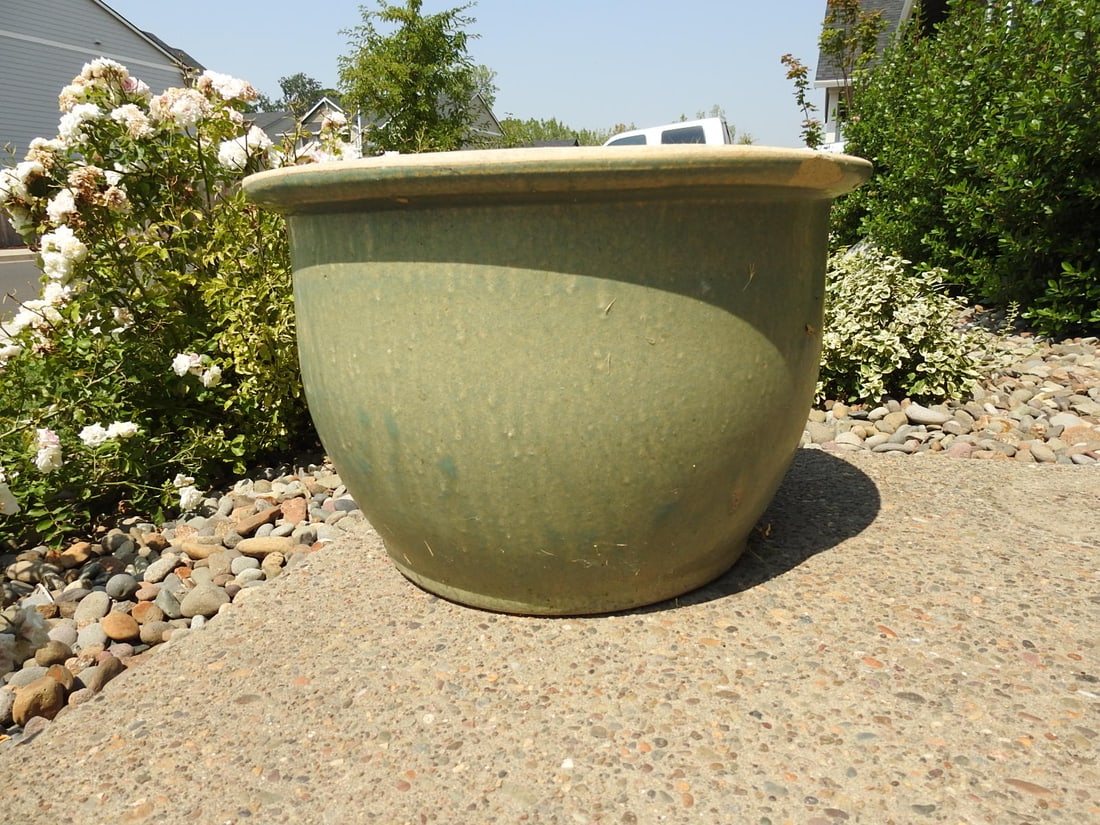 Large Green Glazed Pottery Flower Pot: Large green glazed pottery flower pot for indoor or outdoor plant display. Approx. 12.5 x 19.5 x 19.5 in.