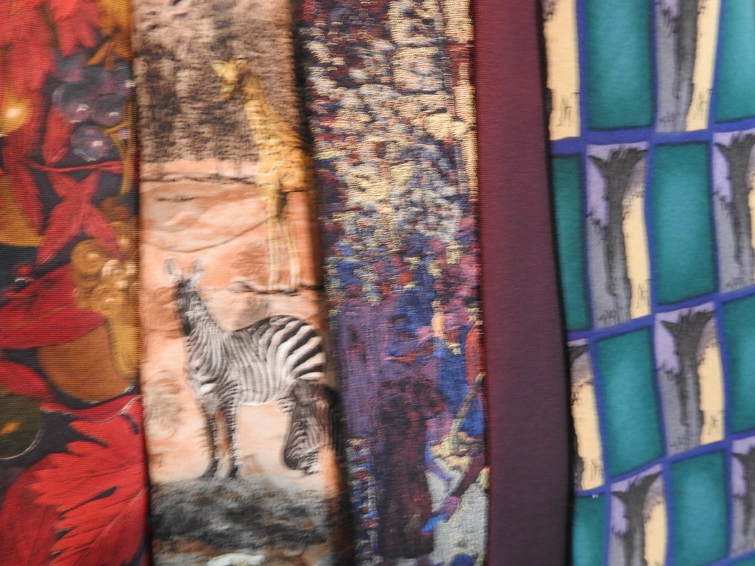 Lot of Eight Silk Ties: Lot of eight silk ties in assorted brands, measured folded. Approx. 5 x 9 x 7.5 in.