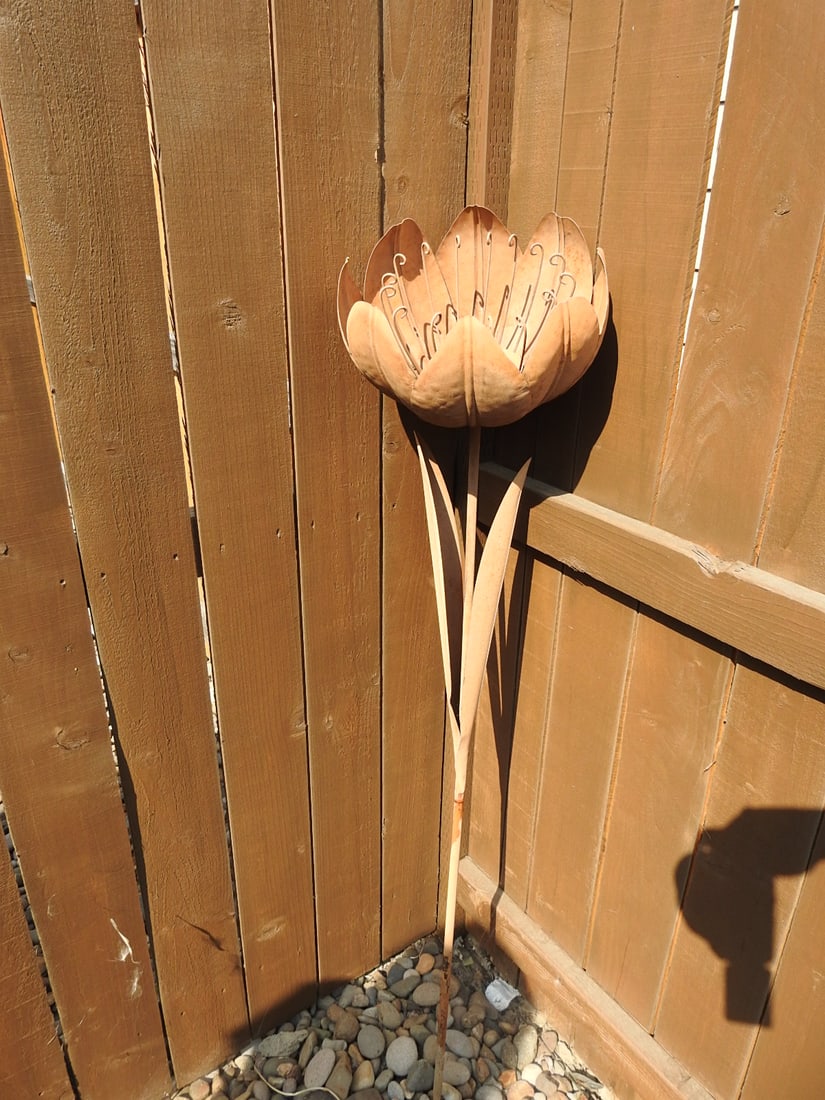 Large Metal Garden Flower Stake Sculpture: Large decorative metal garden flower stake sculpture with layered petal design and weathered outdoor finish. Approx. 33.5 x 13.5 x 13.5 in.