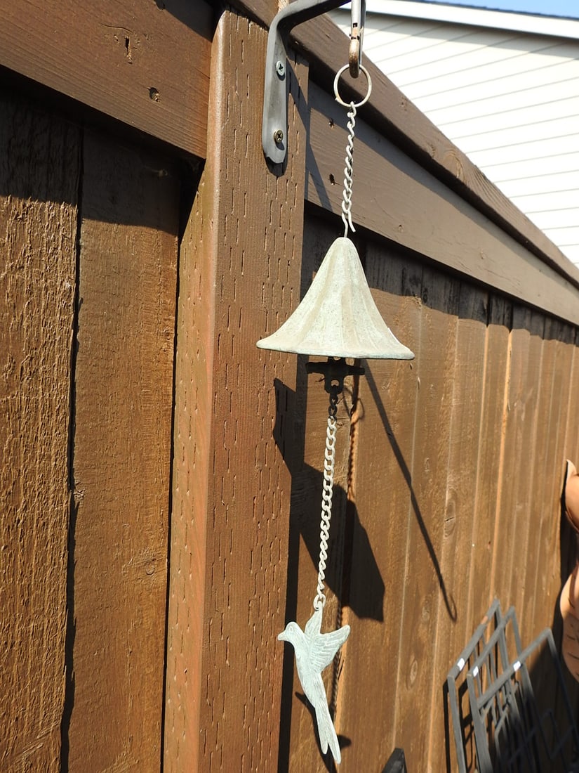 Hummingbird and Morning Glory Metal Wind Chime: Metal wind chime featuring hummingbird and morning glory flower decoration with hanging chime rods. Approx. 4 x 4.5 x 4 in.