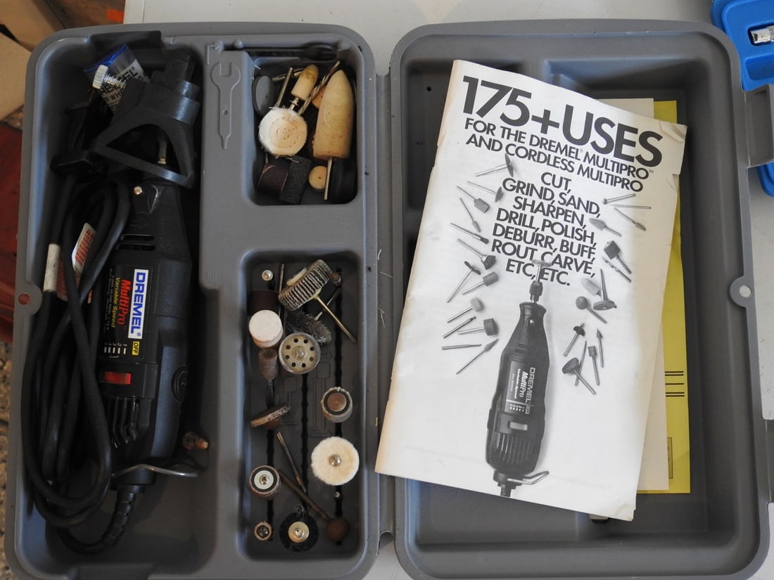 Dremel Rotary Tool and Accessory Set: Dremel rotary tool set with accessory case and booklet marked 175 plus uses, measured as packed. Approx. 4 x 8 x 12 in.