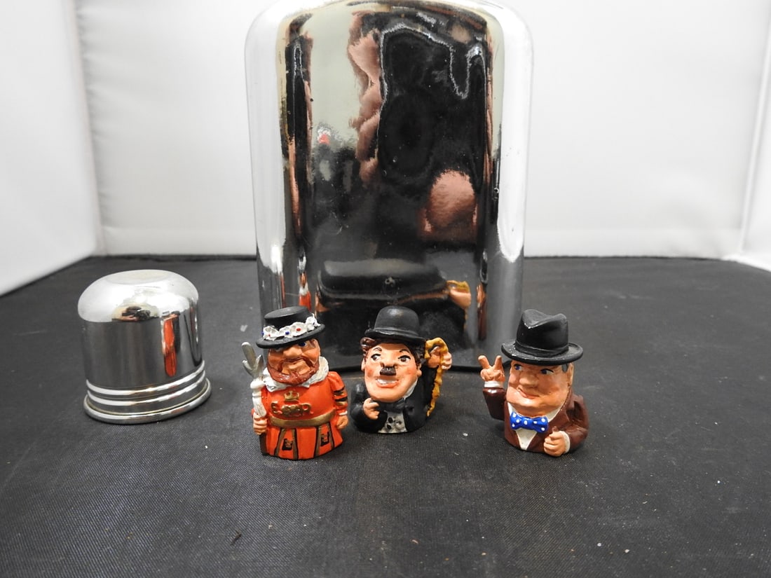 Vintage Whiskey Flask with Pewter Famous Men Thimbles: Vintage whiskey flask with collectible pewter thimbles depicting famous men, measured as packed. Approx. 6.5 x 4 x 2.5 in.