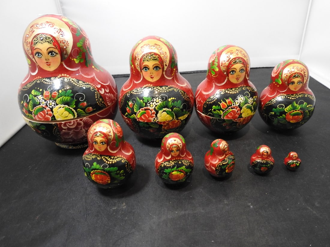 Vintage Hand-Painted Russian Nesting Dolls: Vintage hand-painted wood Russian nesting babushka dolls in graduated sizes, measured as packed. Approx. 5.5 x 4 x 4 in.