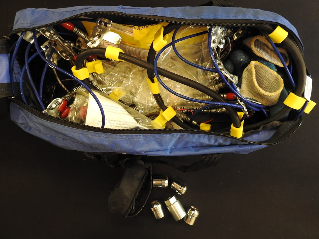 Tire Chain Set: Tire chain set in bag, measured as packed. Approx. 8 x 24 x 10 in.