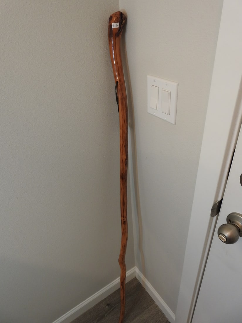 Natural Wood Walking Stick: Natural wood walking stick, measured as packed. Approx. 55 x 3 x 3 in.