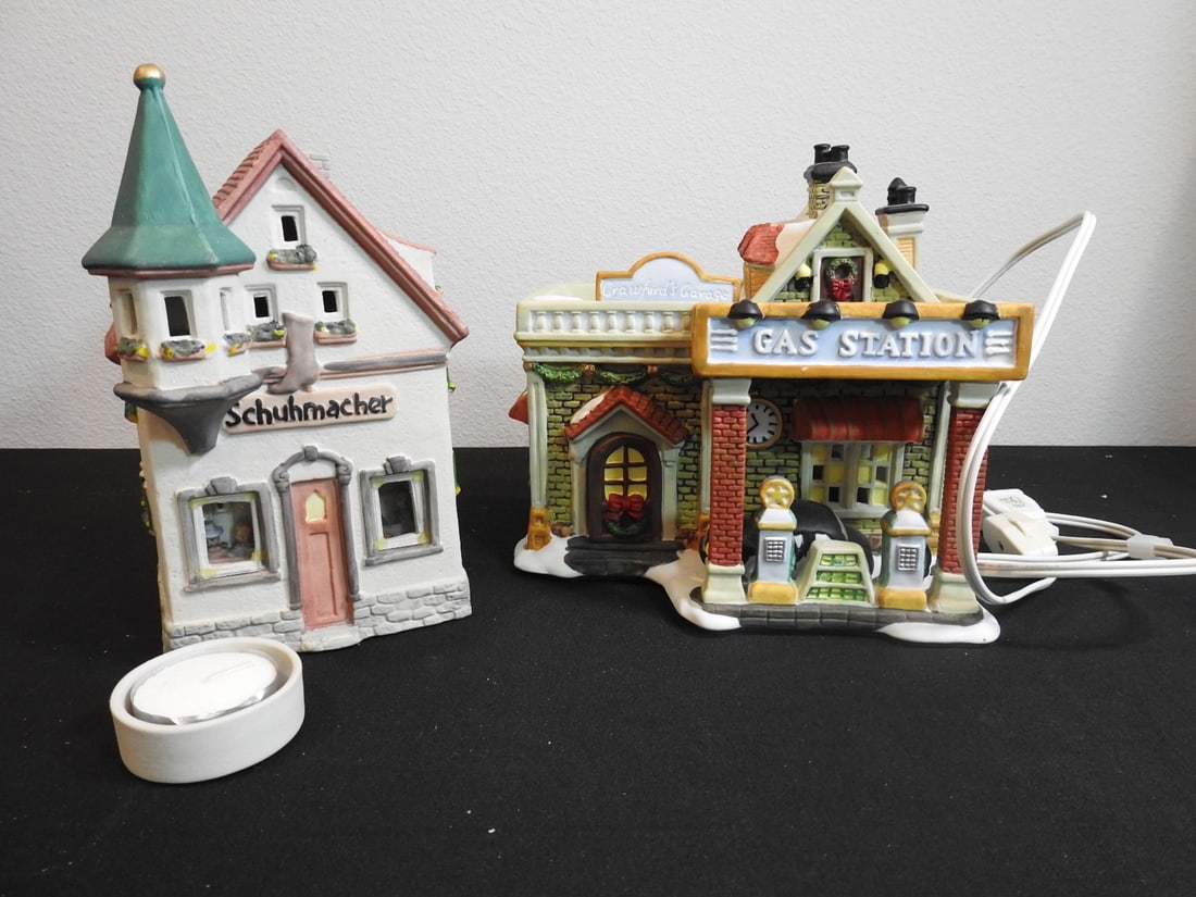 Two Vintage Hand-Painted Porcelain Village Buildings: Two vintage hand-painted porcelain village buildings, measured as packed. Approx. 11 x 17 x 10 in.