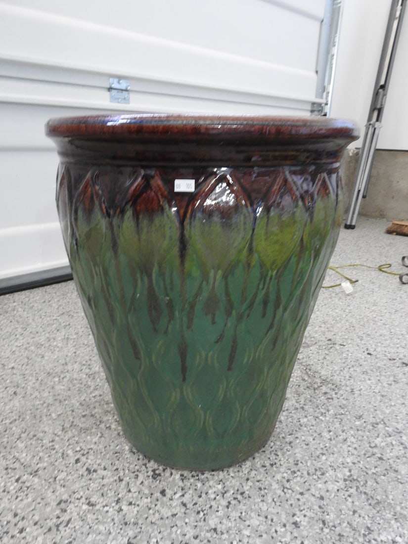 Large Textured Ceramic Planter: Large textured ceramic planter with green and reddish glazed finish, measured as packed. Approx. 20 x 17 x 17 in.