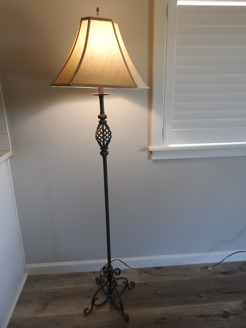 Metal Scrolled Floor Lamp: Metal scrolled floor lamp with shade, measured as packed. Approx. 63 x 16 x 16 in.