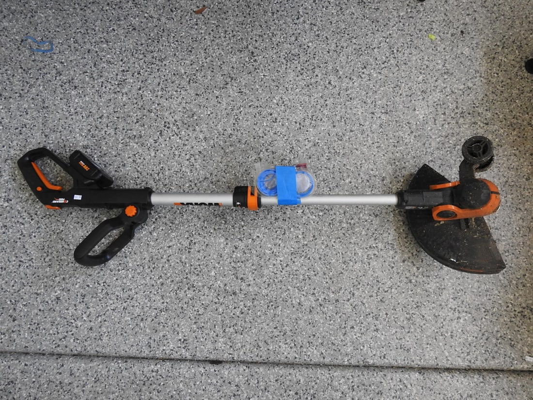 Weed Eater Trimmer with Generic Line: Weed eater / trimmer with generic line included, measured as packed. Approx. 36 x 22 x 31 in.