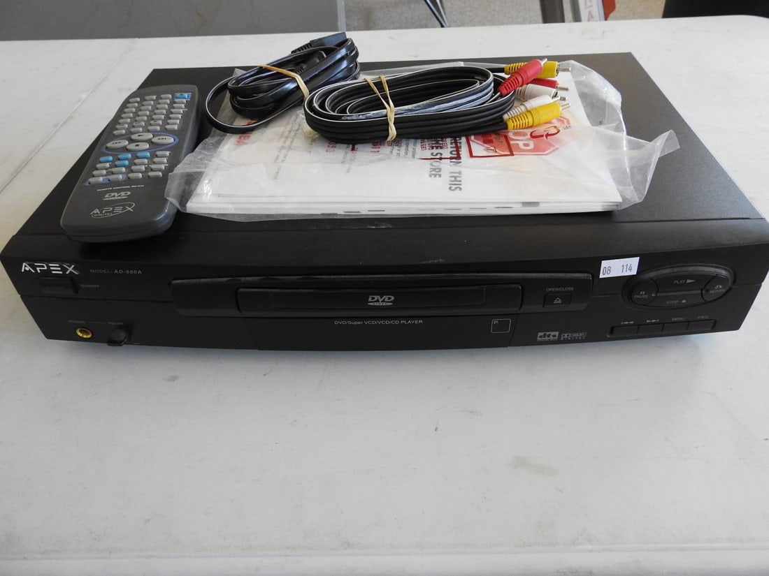 Apex Digital AD-500 DVD Player: Apex Digital AD-500 DVD player with remote, cables, and paperwork as shown, measured as packed. Approx. 6 x 17 x 11 in.
