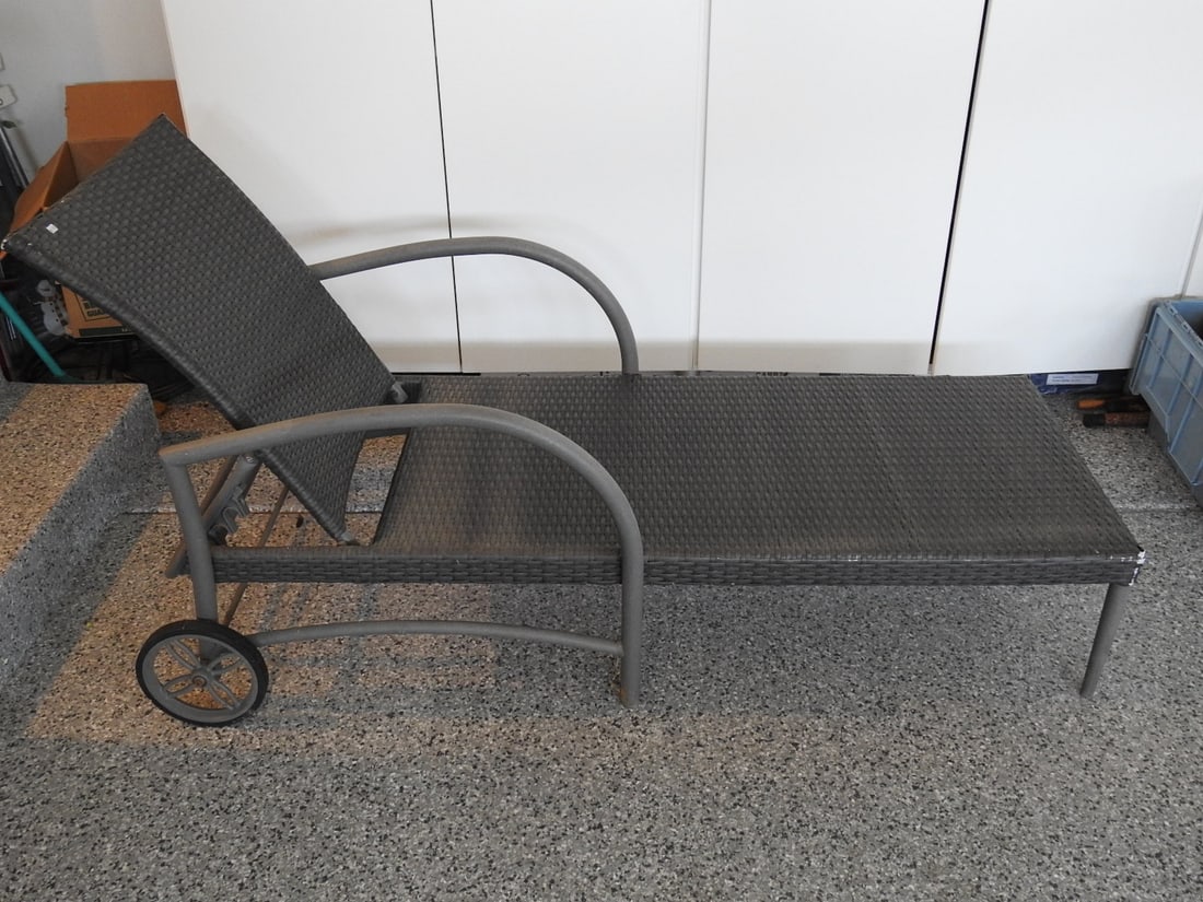 Faux Rattan Lounge Chair with Metal Frame: Faux rattan lounge chair with metal frame, measured as packed. Approx. 32 x 28 x 55 in.