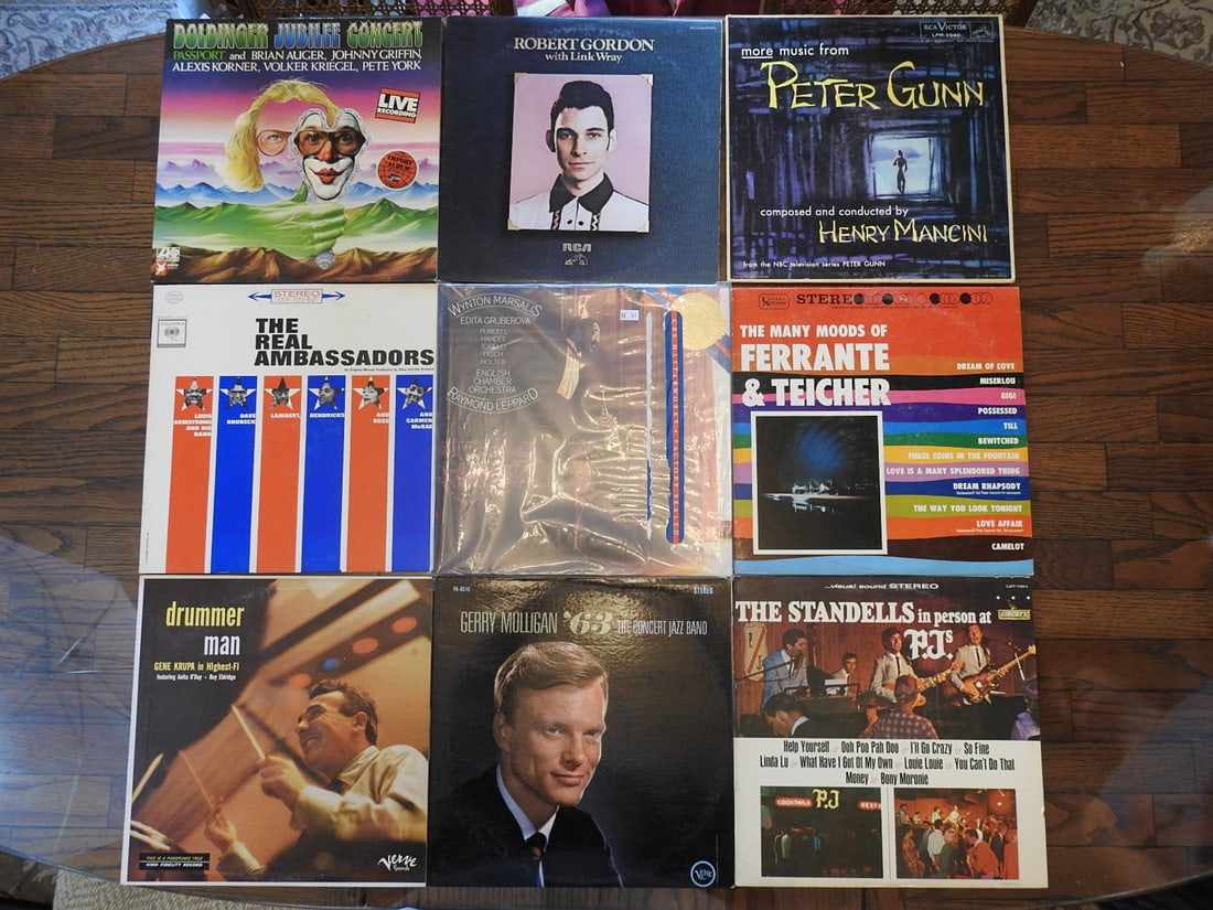 Lot of Nine Assorted Vinyl Records: Lot of nine assorted vinyl records, one photo per lot as noted. Visible records include mixed rock, pop, country, jazz, and easy listening titles. Approx. 2 x 13 x 13 in.