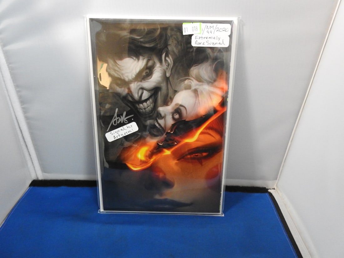 The Joker 80th Anniversary 100-Page Super Spectacular #1 Artgerm Variant - Signed: The Joker 80th Anniversary 100-Page Super Spectacular #1 with Artgerm variant cover. Signature visible on cover; protected as photographed.