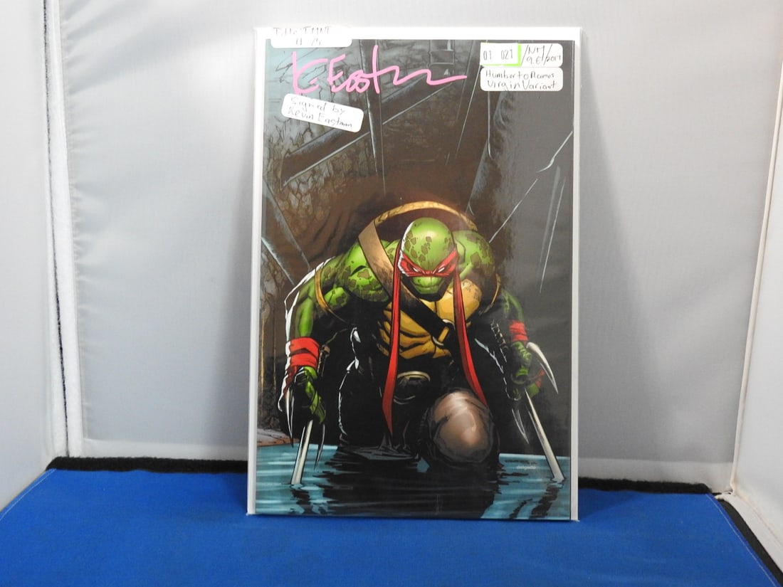 Teenage Mutant Ninja Turtles #75 Kevin Eastman Signed Virgin Variant: Teenage Mutant Ninja Turtles #75 Planet Awesome Collectibles exclusive virgin variant. Signed by Kevin Eastman; signature visible on cover.