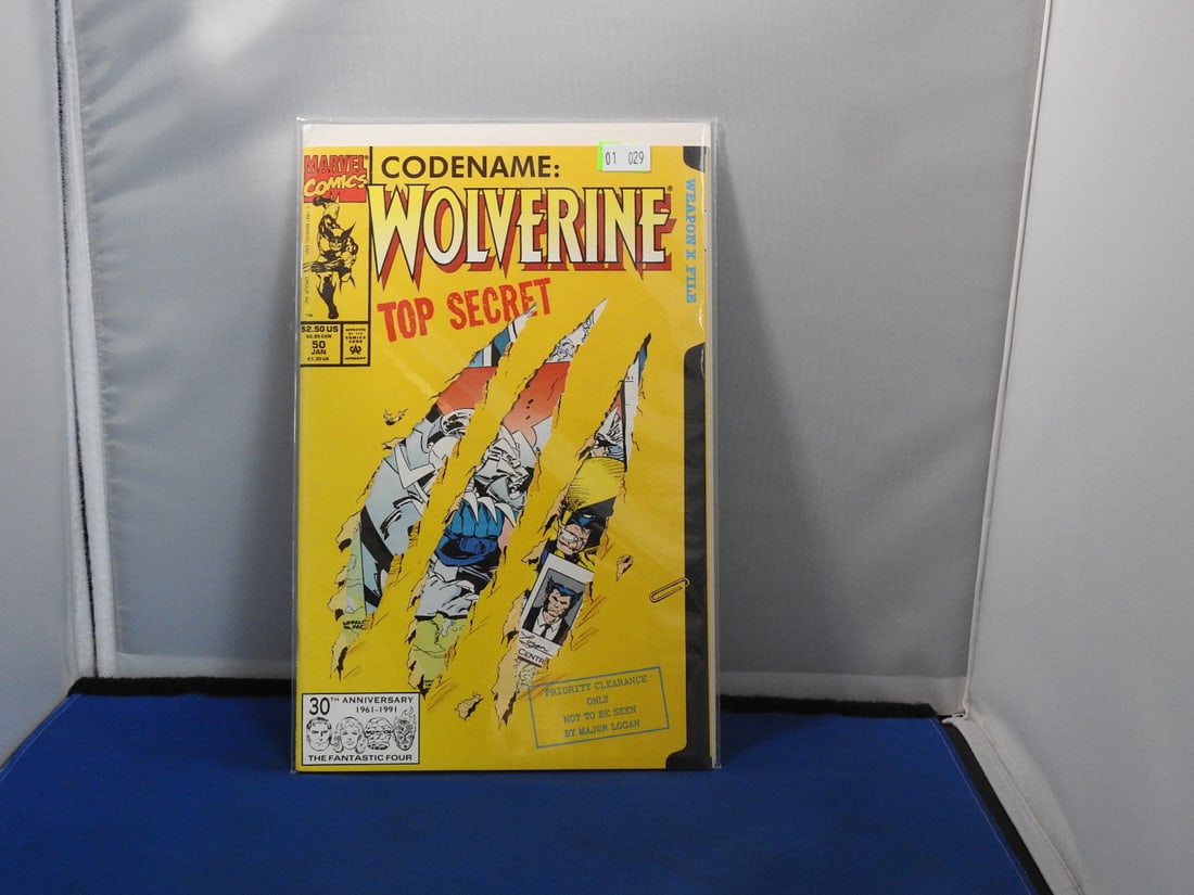 Wolverine #50 - 1992 30th Anniversary Issue: Wolverine #50 featuring the 30th Anniversary 1961-1991 Fantastic Four cover design.