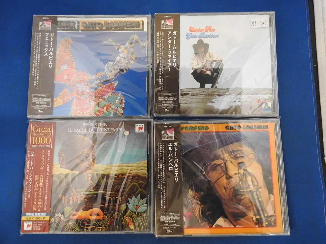 Japanese Import CD Lot of 4 - Gato Barbieri & Bernstein: Lot of four Japanese issue/import CDs with obi strips as photographed. Includes Gato Barbieri Under Fire, El Pampero and Fenix, plus Bernstein conducting Stravinsky Le Sacre du Printemps with the