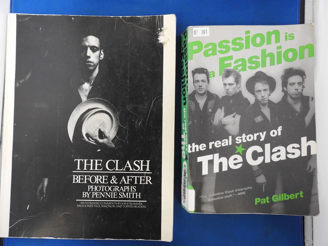 The Clash Two-Book Lot - The Clash & Passion Is a Fashion: Two-book lot focused on The Clash, including The Clash and Passion Is a Fashion: The Real Story of The Clash. Softcover books as photographed.