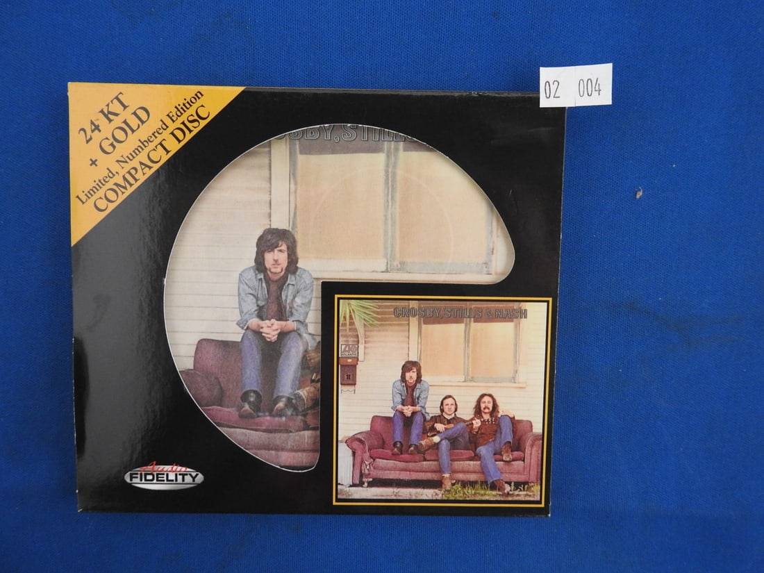 Crosby, Stills & Nash Gold CD: Crosby, Stills & Nash compact disc with gold-colored disc, jewel case and original booklet/inserts as photographed.