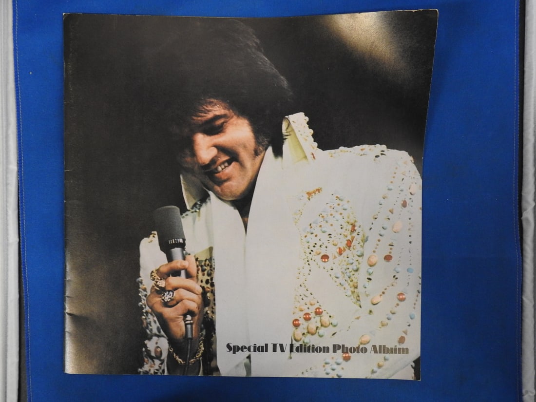 Elvis Presley Special TV Edition Photo Album - 16 Pages: Elvis Presley Special TV Edition photo album containing 16 pages of performance and portrait photography, as photographed.