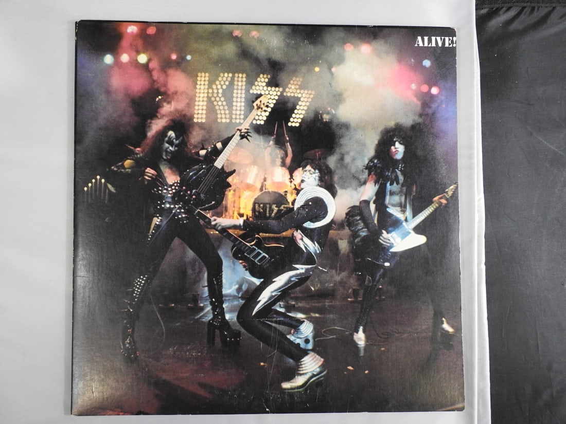 KISS Alive! Double Vinyl LP with Booklet: KISS Alive! double live vinyl LP set with two records, gatefold album packaging and included booklet/materials as photographed.