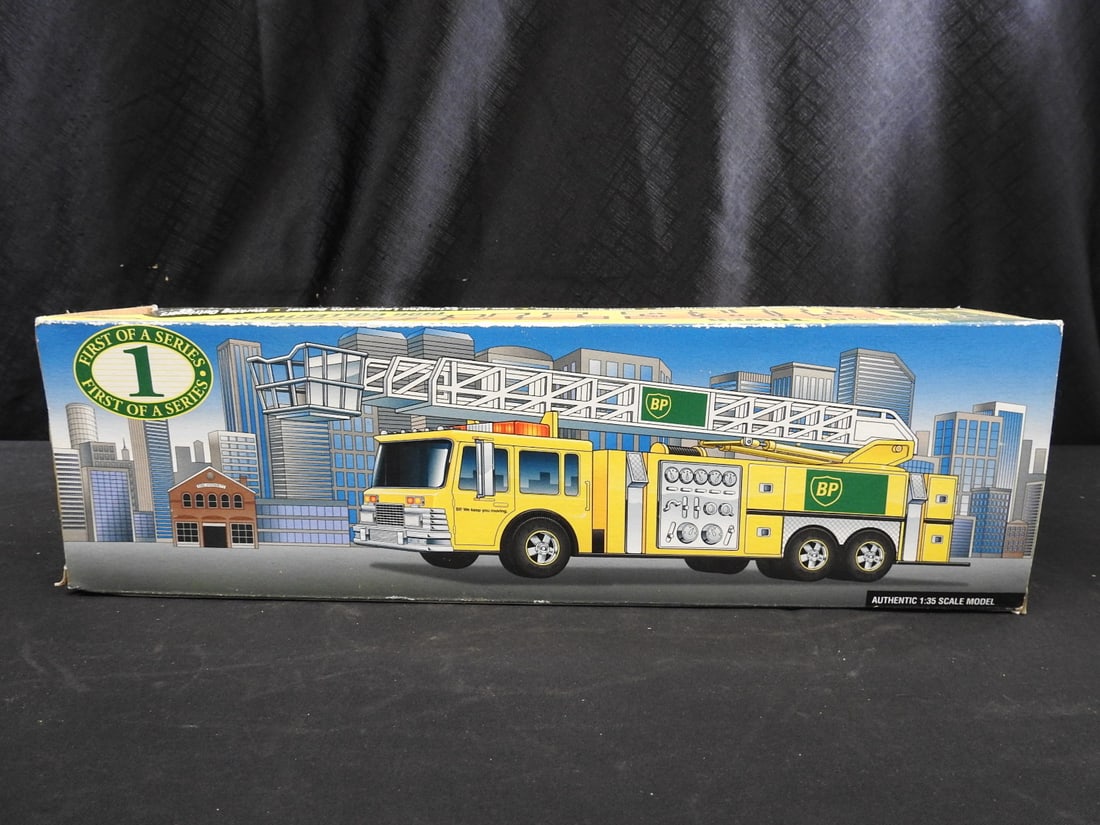 1996 BP Aerial Tower Fire Truck Collector's Edition: Boxed BP Aerial Tower Fire Truck Collector's Edition by Tosco Corporation, dated 1996. Packaging advertises working lights, dual-sound siren, extension ladder and outriggers.