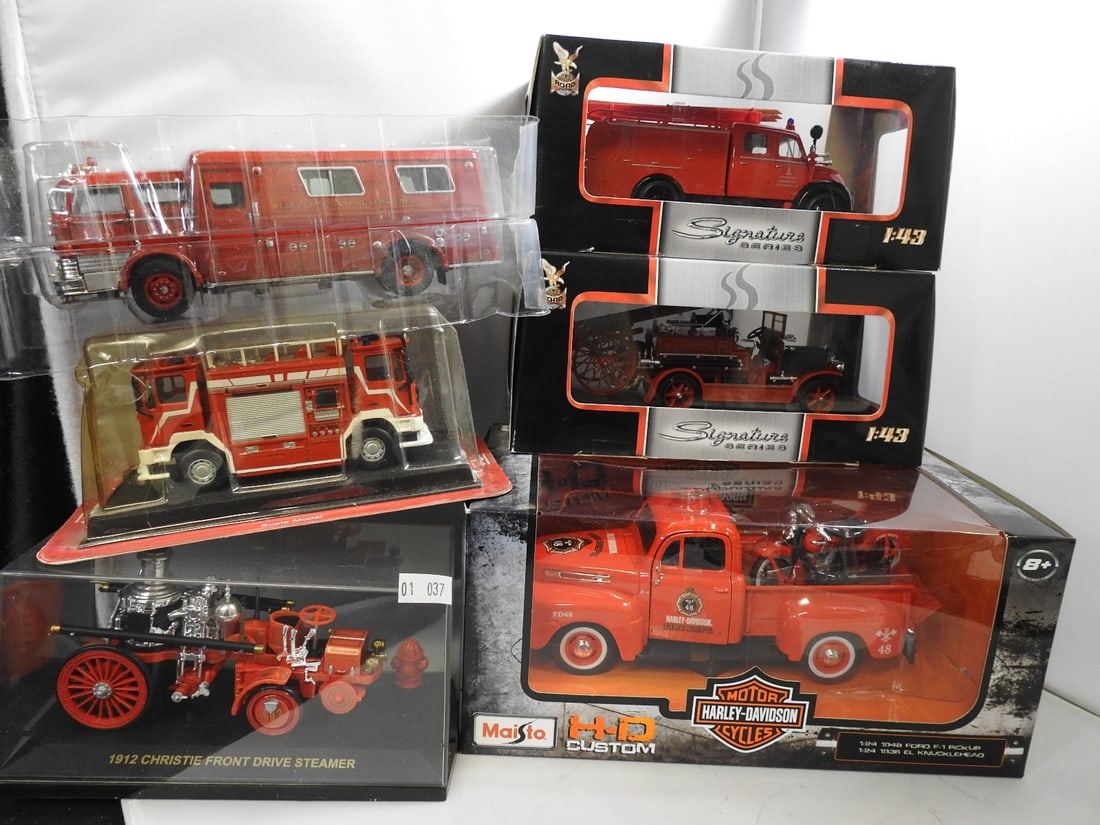Boxed Fire Apparatus Models, Lot of 6: Group of six boxed or display-based fire apparatus models. Visible subjects include a 1912 Christie Front Drive Steamer, Maisto 1948 Ford F-1 fire pickup, Signature Series apparatus and West