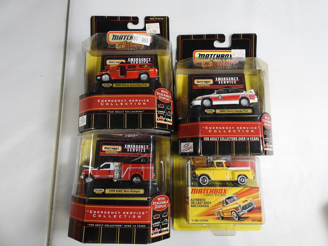 Matchbox Collectibles Emergency Service Vehicles, Lot of 4: Four packaged Matchbox Collectibles models: 2000 Chevy Suburban Fire, 1999 KME Mini-Pumper, an additional emergency-service vehicle and a 1957 GMC Stepside pickup.