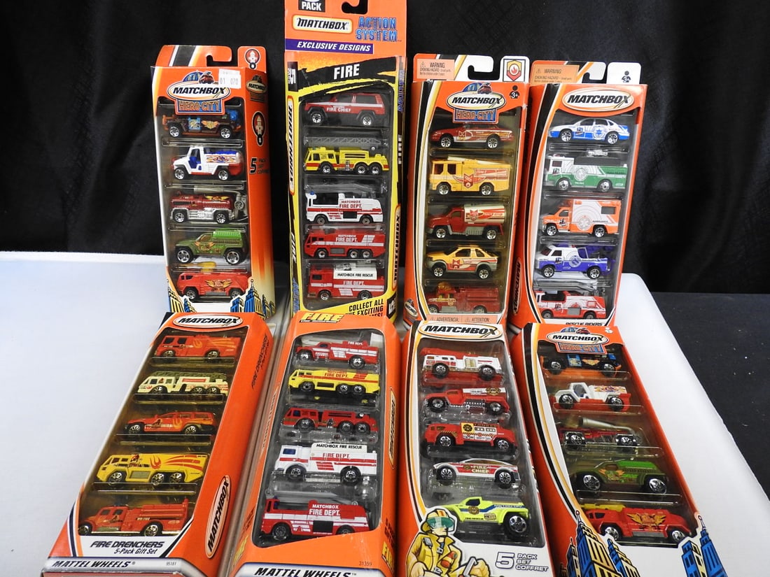 Matchbox Fire and Emergency Five-Packs, Lot of 8: Eight Matchbox five-vehicle packs featuring Fire Dreamers, Hero City, Fire, police, rescue and emergency subjects. Approximately 40 vehicles total as packaged.