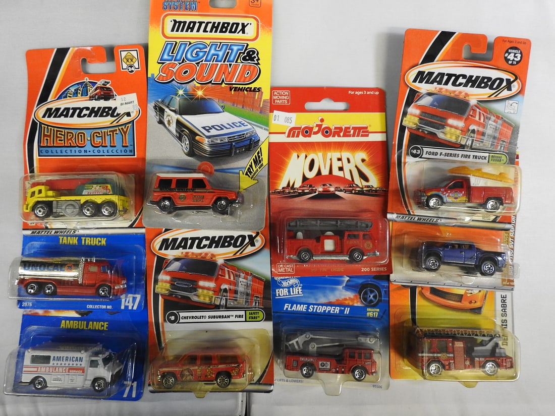 Matchbox, Hot Wheels and Majorette Emergency Vehicles: Mixed carded assortment of fire, rescue and service vehicles by Matchbox, Hot Wheels and Majorette, including Hero City, Light & Sound, Movers, ambulances, tank trucks and Flame Stopper models.