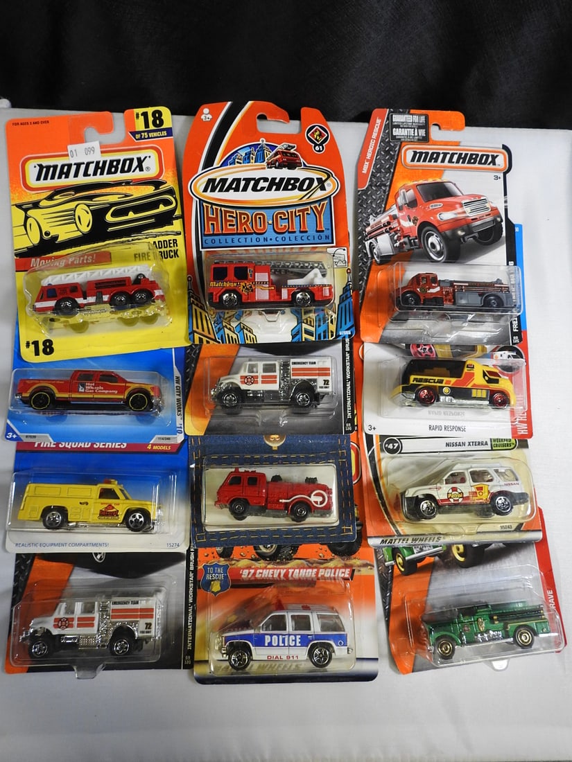 Matchbox, Hot Wheels and Tomy Emergency Vehicles: Mixed carded assortment of fire and emergency vehicles by Matchbox, Hot Wheels and Tomy Pocket Cars. Includes ladder trucks, police, utility and rescue subjects shown.