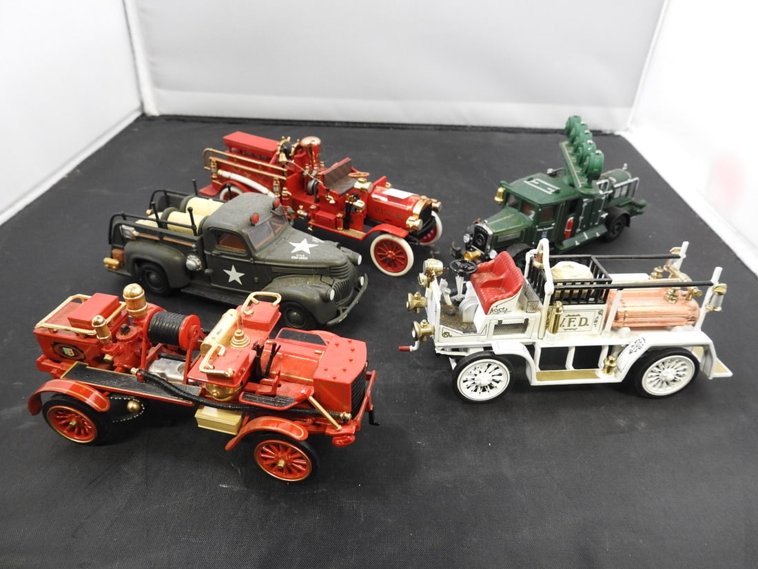 Matchbox Models of Yesteryear Fire Vehicles, Lot of 5: Five loose Matchbox Models of Yesteryear fire and service vehicles, including vintage pumpers, a ladder truck and an Army fire truck.