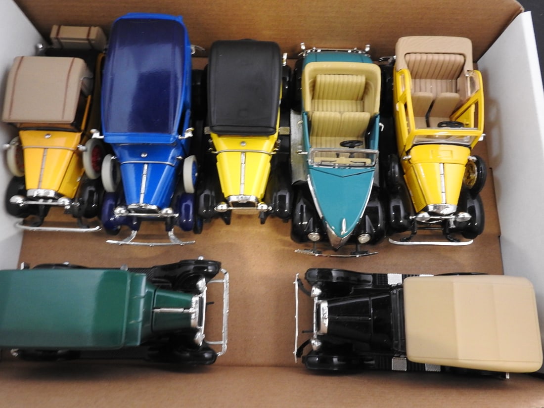 Ford and Vintage-Style Model Car Collection: Loose collection of vintage-style Ford and other classic automobiles, including coupes, convertibles, sedans and utility vehicles in assorted colors.