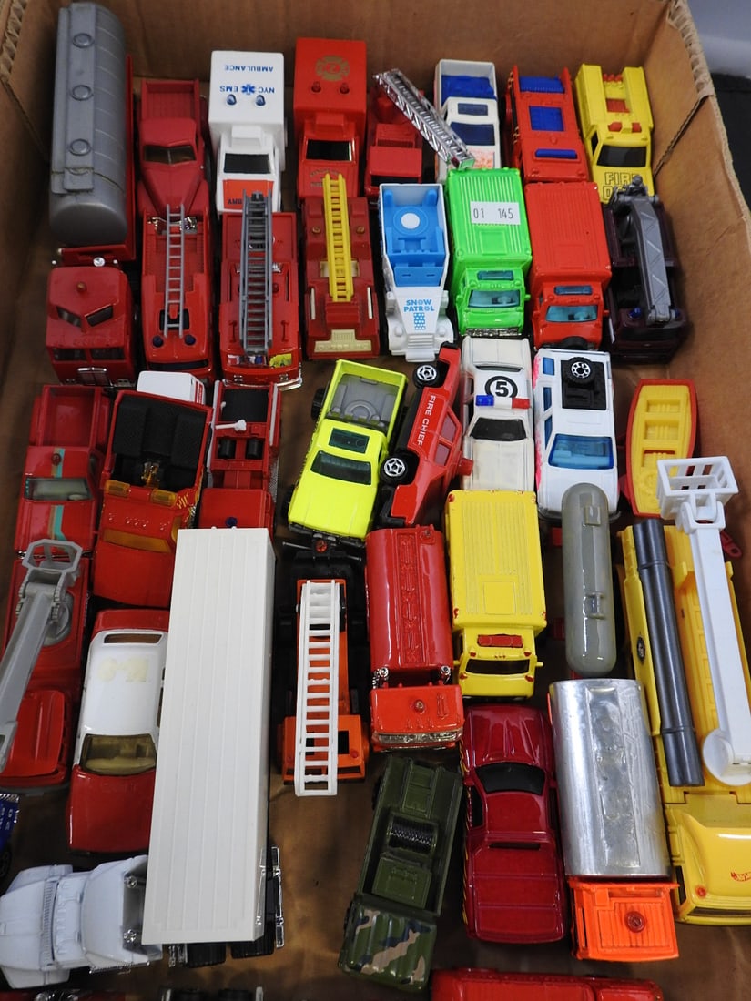 Large Mixed Cars, Trucks and Construction Vehicles: Large loose assortment of cars, fire engines, tankers, construction equipment, racing vehicles and service trucks in mixed scales.