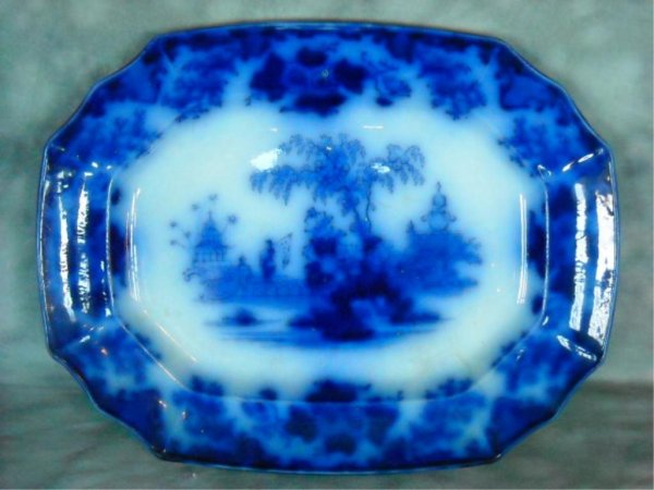 Early Flow Blue Platter: Awesome platter. Great color. Circa 1830-1880 Condition : a tight hairline