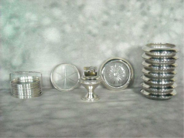 Grouping Of Sterling Cut Glass Coasters, Lighter: a.Two sets eight sterling silver glass coasters b.Table top lighter.