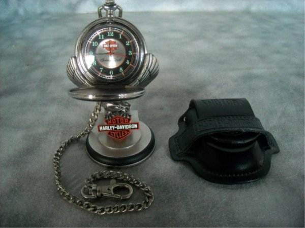 Franklin Mint Harley Davidson Pocket Watch, Stand: Signed silveroid hunters case pocket watch with a Harley Davidson pewter watch stand and a leather case.