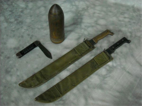 Group of Military Knives and Shell: a.Two machetes b.Pocket knife by Colonial Providence Rhode Island. c.Shell