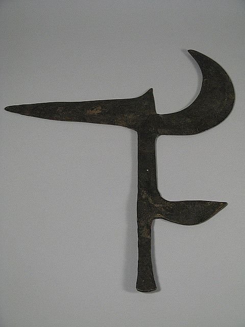 African Tribal Iron Throwing Knife: H. 15" by W. 12 1/4".