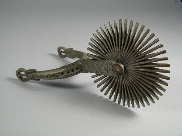 Cowboy Boot Spur: Measures 8" L. with a 4" D. spur.