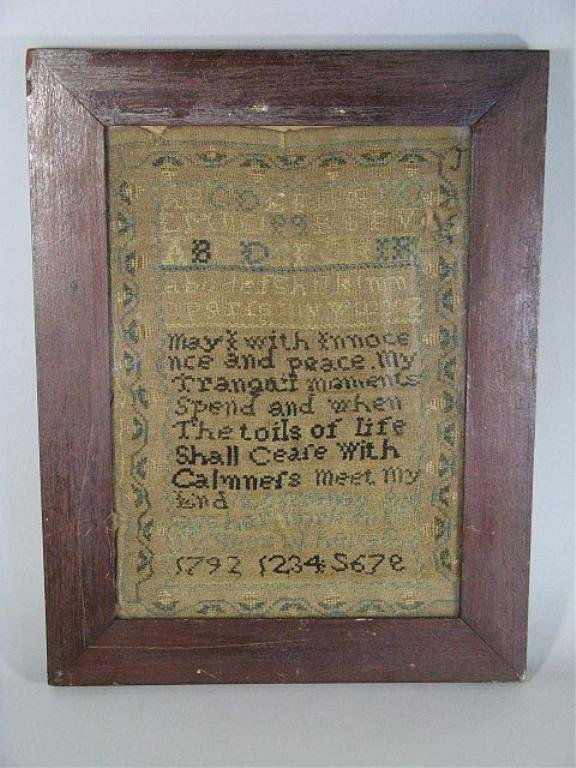 18th Century 1792 Needlepoint Sampler: 13 1/2" by 9 1/2". Does appear to have a 3/4" D. tear near top right. "Lewraney Ayars at age 12, her work in the 12 year of her age, 1792. Alphabet above, flowering vine border" Mortise and tenon fram